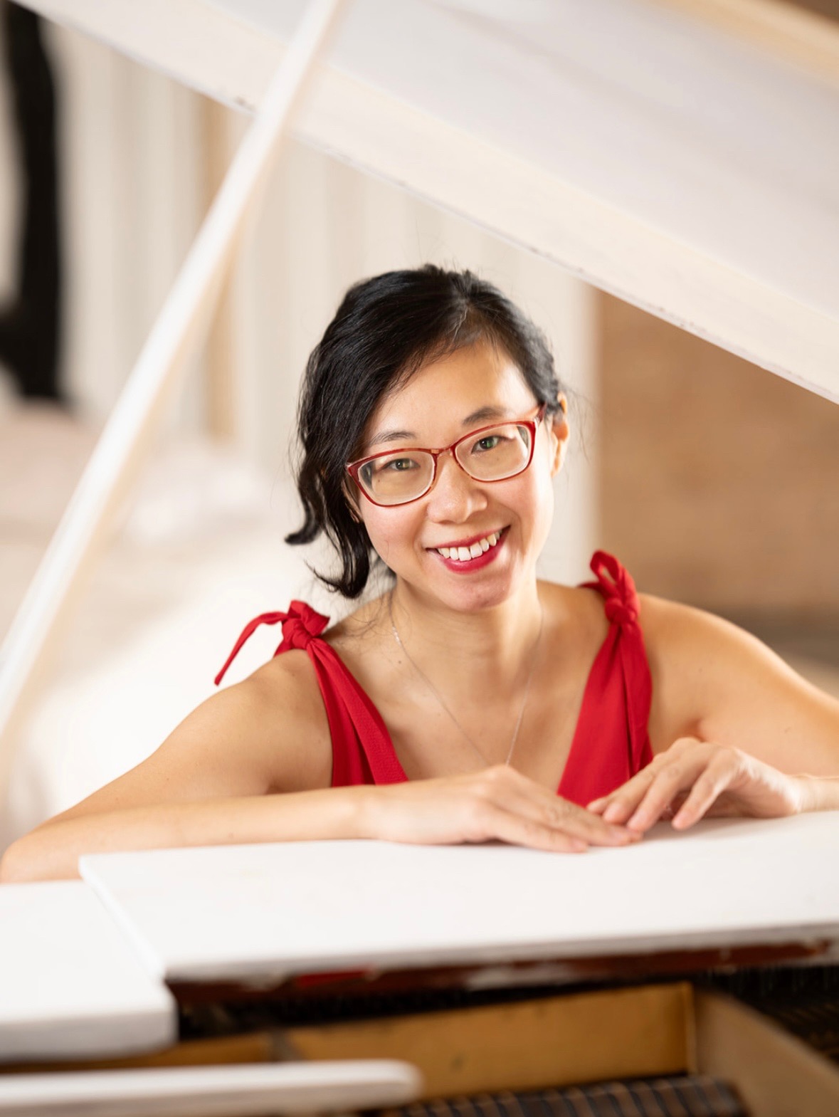 Dr. Gao teaching at the piano